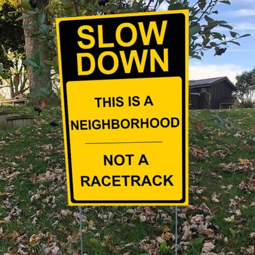 Slow Down This Neighborhood is Not a Racetrack Sign